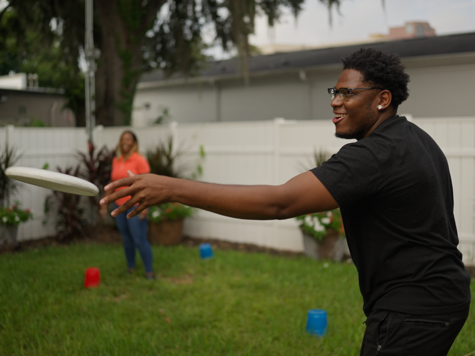 Odyssey Behavioral Healthcare - Facility Teams - Lifeskills client playing frisbee outside